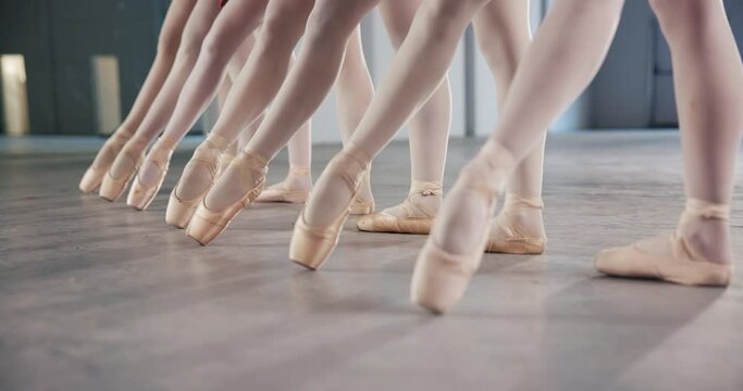 Ballet, dance and legs of group in class for performance art, practice and learning of routine. Studio, ballerina and feet of women at training in creative school for teamwork, flexibility or balance
