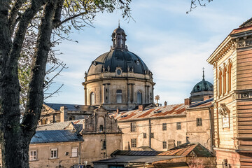 View of the ancient architecture of Lviv with the dome of The Dominican church and monastery...