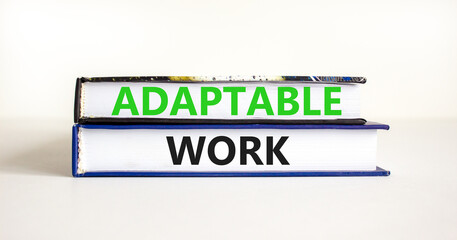 Adaptable work symbol. Concept words Adaptable work on beautiful books. Beautiful white paper background. Business Adaptable work concept. Copy space.