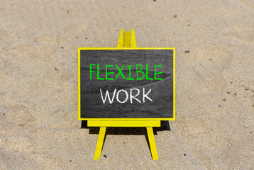 Flexible work symbol. Concept words Flexible work on beautiful yellow blackboard. Beautiful sand beach background. Business Flexible work concept. Copy space.