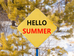 Hello summer symbol. Concept words Hello summer on beautiful yellow road sign. Beautiful forest...