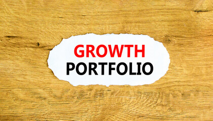 Growth portfolio symbol. Concept words Growth portfolio on beautiful white paper. Beautiful wooden...