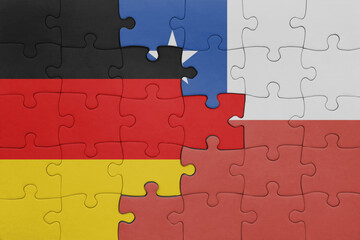 puzzle with the colourful national flag of chile and flag of germany.
