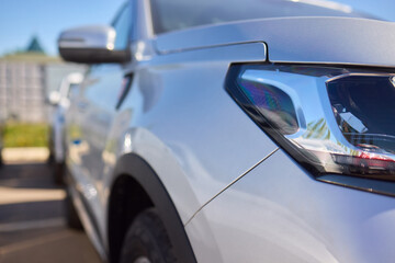 Fototapeta premium Car Sales and Loan Industry Concept. Row of Brand New Vehicles in Stock.