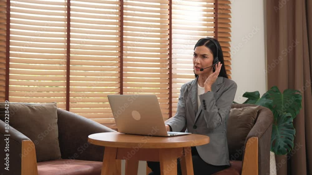 Aufkleber female call center operator or customer service helpdesk staff working on workspace while talking on