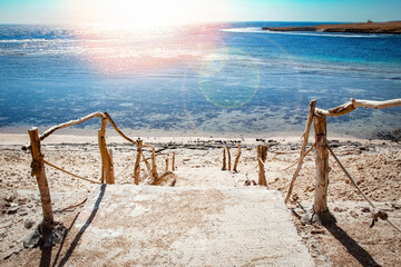 Road steps to the sea in nature in the park