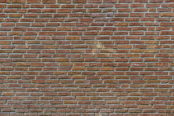 Brick red wall. Beautiful artificial background