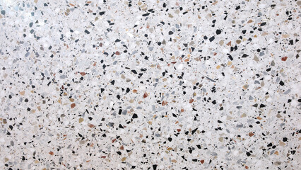 Abstract textured stone background with a pattern of small particles interspersed