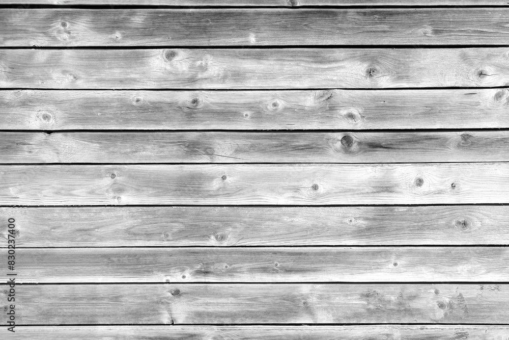 Poster A wooden background with a few small black dots. The background is mostly white and the dots are scattered throughout