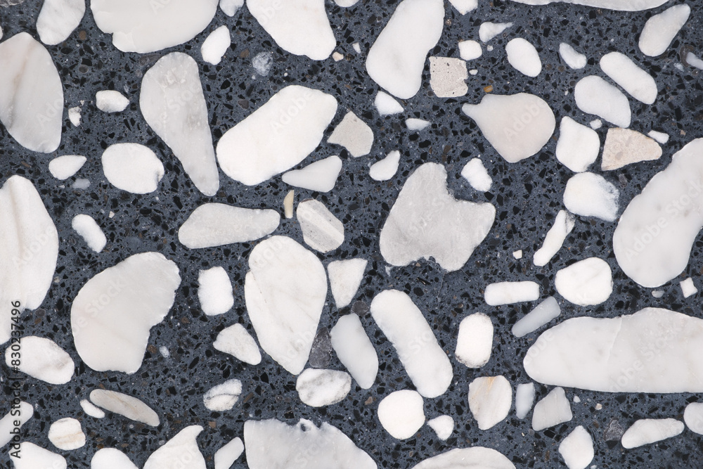 Poster abstract textured stone background with a pattern of small particles interspersed