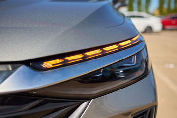 Close up of a cars headlight, part of automotive design