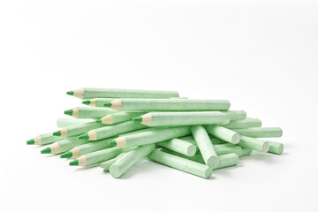 Green Chalk Sticks on White Background