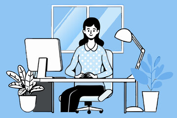 female programmer sitting in a relaxed position at the computer in the office