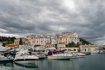 View of yachts and town in Rodi Garganico harbor. Italy