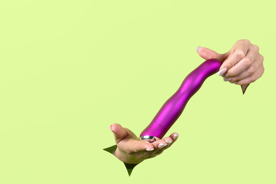 A vibrator. A sex toy. Vaginal stimulation. Copy space. Vibrating massager