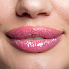 Fototapeta premium close up lips of woman, pink lipstick, beautiful smile, woman with perfect teeth