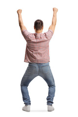 Rear view shot of a happy young man cheering with arms up