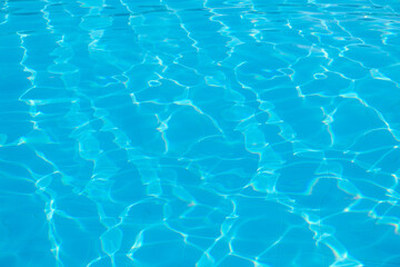 surface of blue swimming pool, background of water in swimming pool.