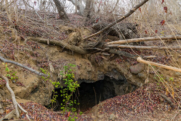 Overgrown remains of a tunnel leading towards a Japanese World War 2 machine gun emplacement on Gili Trawangan, Indonesia