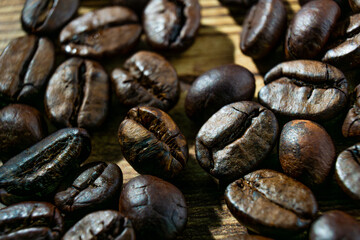 A Pile of Coffee Beans on a Wooden Table
