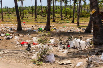 Fields and tracks covered in huge amounts of plastic and garbage on Gili Trawangan in Indonesias...