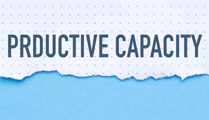 Productive Capacity, text on white paper on blue background