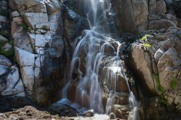 serene waterfall in the mountains