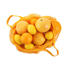 String bag with oranges and lemons isolated on white, top view