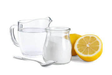 Baking soda in jar, vinegar and lemons isolated on white