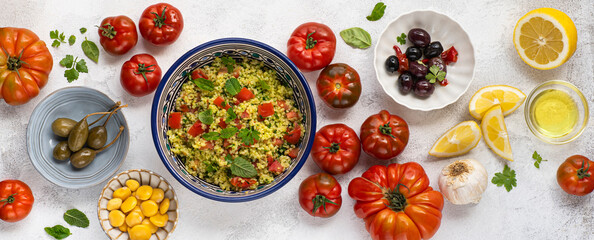 Tabbouleh o tabulè salad,  Arab dish from the Middle East nd  Mediterranean, with parsley,...
