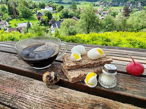 coffee, bread  and quail eggs in the pure nature
