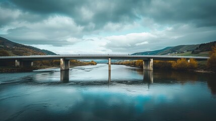 A bridge over a wide river, illustrating the connection and possibility in freedom