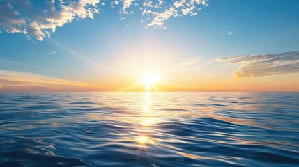 Obraz premium A sunrise over a calm sea, representing the new beginnings and opportunities in freedom