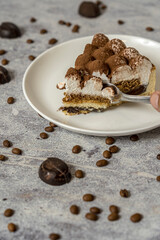 Sweet homemade vanilla cake with dulce de leche meringue and coffee