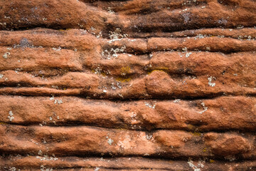 Multiple layers of eroded and striated sandstone