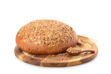 Wooden board with fresh bread, wheat spikelets and spoon of grains on white background