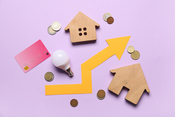 House figures with light bulb, arrow, coins and credit card on lilac background. Price rise concept