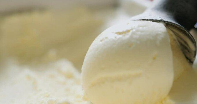 4K footage Close-up Front view, Scoop out vanilla-flavored ice cream.