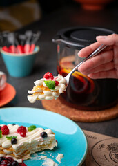 Delicate dessert with whipped cream and berries