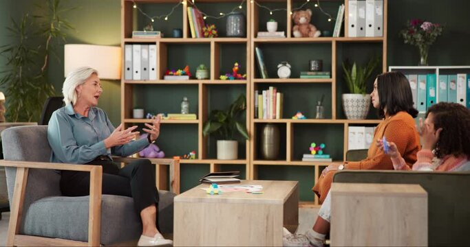 Psychologist, mother and child or office talking with daughter playing or stimming toy, discussion or advice. Parent, woman and conversation for adhd diagnosis or neurodivergent, treatment or therapy