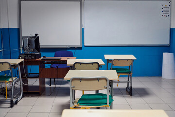 Empty chairs in classrom. Modern furniture. Interior of cafe. Conference hall.