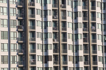 Big tall building background with windows and glass.
