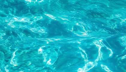 Fototapeta premium A Close-Up Macro Shot Capturing the Beautiful Texture of Turquoise Blue Ocean Water Surface, Adorned with Light Reflections and Highlights, Evoking a Sense of Calm and Serenity. 