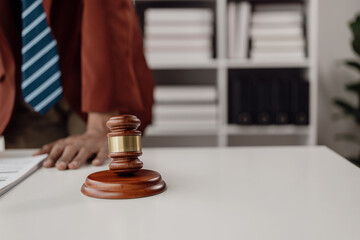 Lawyers provide legal advice. Represent clients in court and help with legal documents expert male lawyer discusses tax documents working in the office at a meeting legal consulting concept