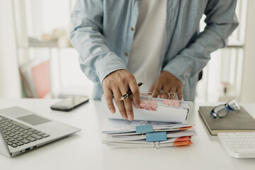 Auditor and accounting team working in the office Analyze financial data and accounting records...