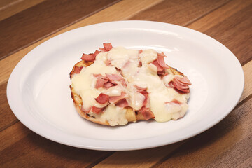 Delicious chicken Milanese bathed in Alfredo sauce