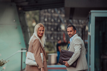 Modern business couple after a long day's work, walking together towards the comfort of their home, embodying the perfect blend of professional success and personal contentment.