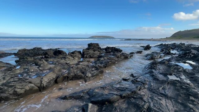 Landscape 4k footage of the rocks and ocean in front of Rosetta Head on the Victor Harbor Heritage Trail on the Fleurieu Peninsula in South Australia
