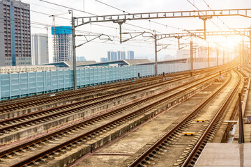 Fototapeta premium High speed intercity trains departing under the sunshine