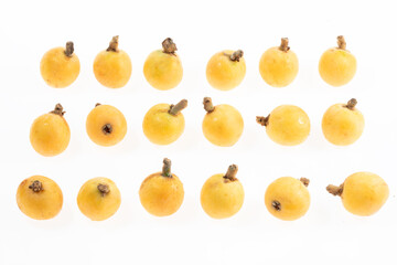 White jade loquat on white background in Suzhou, Jiangsu Province, China